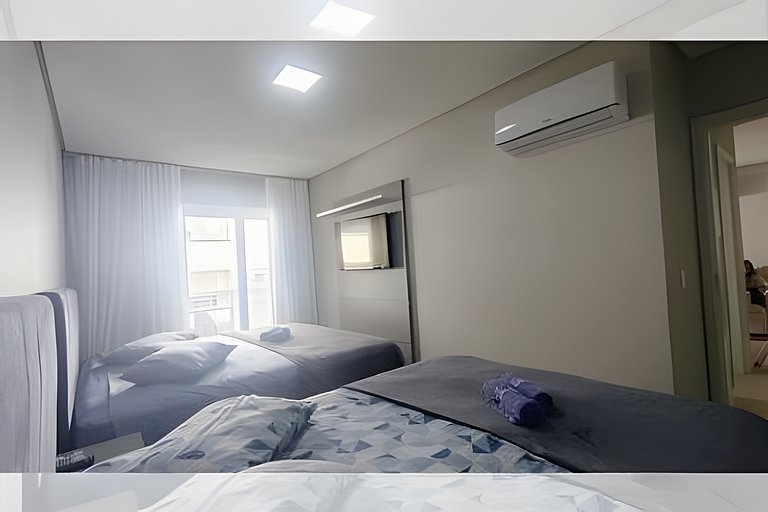 Apto em HomeClub top! Frente mar A/C e 02 garagens