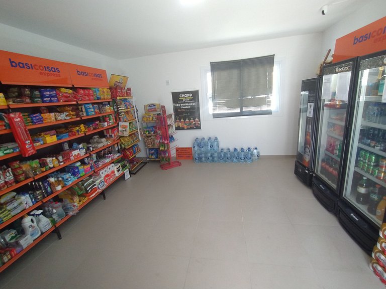 Apto em HomeClub top! Frente mar A/C e 02 garagens